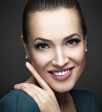 Woman smiling after getting facial procedure from Chicago Plastic Surgery LLC